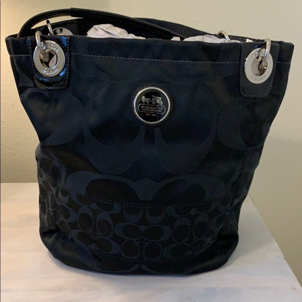 Coach signature shoulder bag.
